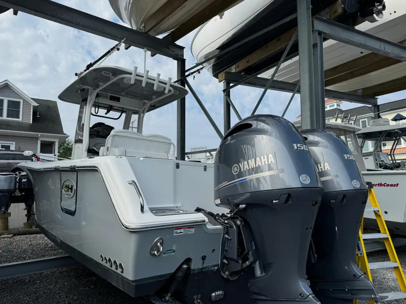 Slide: The Image of 2018 Sea Hunt Gamefish 27 with twin Yamaha engines in storage. - 1
