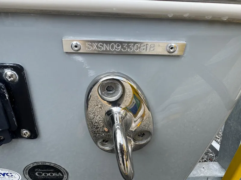 Slide: The Image of 2018 Sea Hunt Gamefish 27 boat hull identification number and hardware. - 12