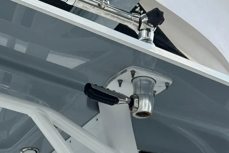 Slide: The Image of Close-up of a 2018 Sea Hunt Gamefish 27 boat component, featuring a metal fitting and handle. - 8