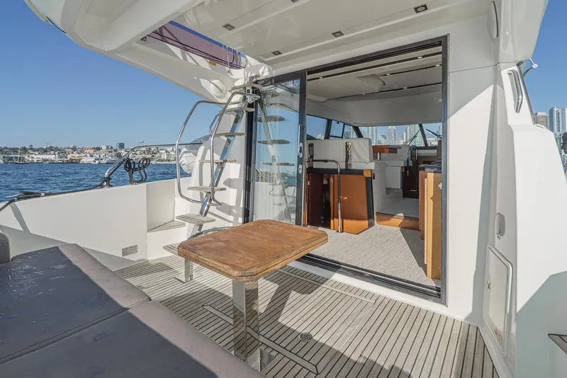 Slide: The Image of Prestige 420 yacht interior, 2015 model, featuring open deck and modern design. - 15