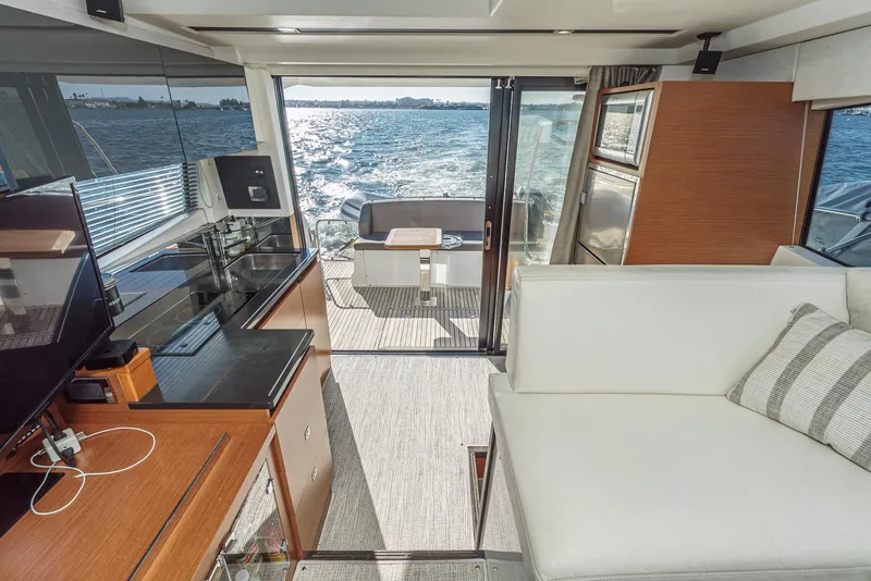 Slide: The Image of Interior of 2015 Prestige 420 yacht with modern furnishings and ocean view. - 17