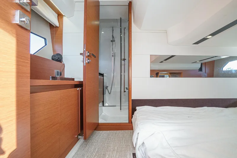 Slide: The Image of Luxurious interior of 2015 Prestige 420 yacht with modern bathroom and cozy bedroom. - 28