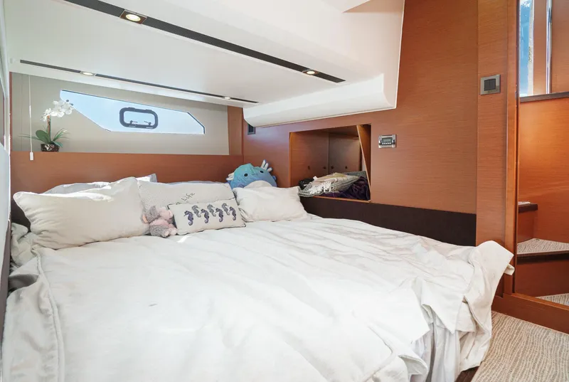 Slide: The Image of Luxurious bedroom interior of 2015 Prestige 420 yacht with cozy bedding and modern design. - 29