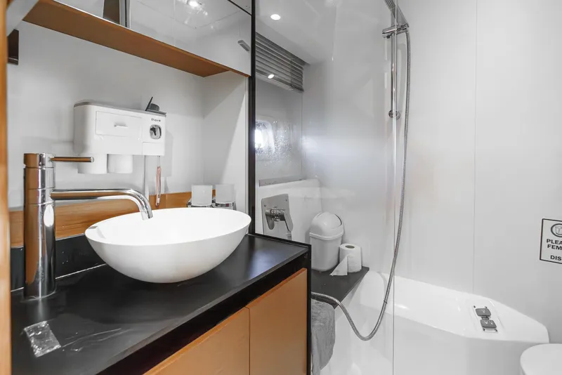 Slide: The Image of Modern bathroom in 2015 Prestige 420 yacht with sleek sink and shower. - 30