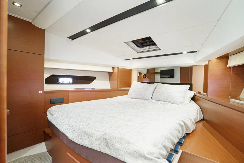 Slide: The Image of Luxurious cabin interior of 2015 Prestige 420 yacht with cozy bed and modern design. - 31