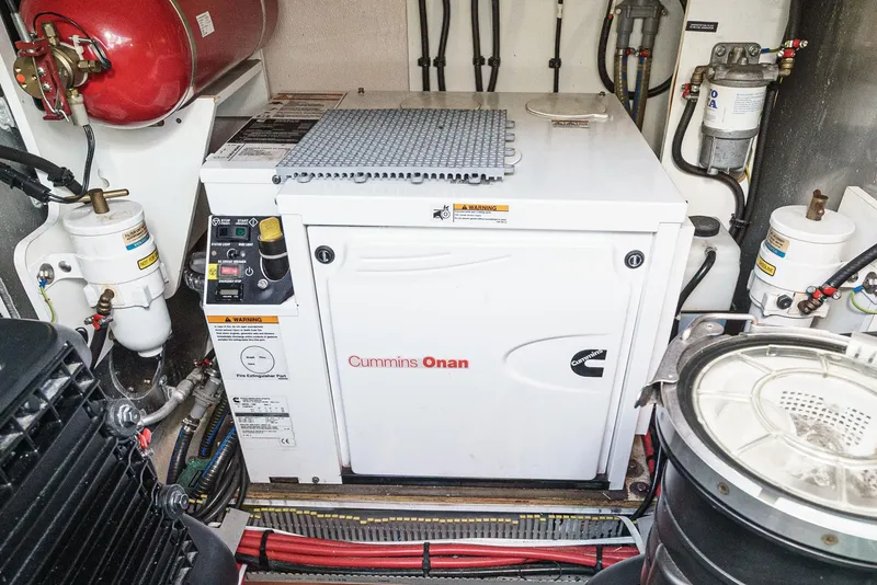 Slide: The Image of Cummins Onan generator in a 2015 Prestige 420 yacht engine room. - 36