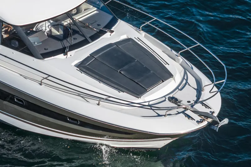 Slide: The Image of Prestige 420 yacht, 2015 model, cruising on blue ocean waters. - 6