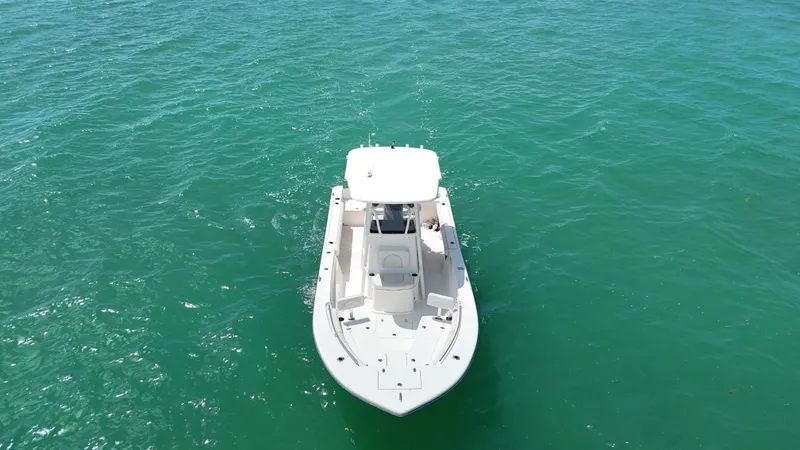 Slide: The Image of 2023 Sea Born LX24 boat on clear turquoise water. - 6