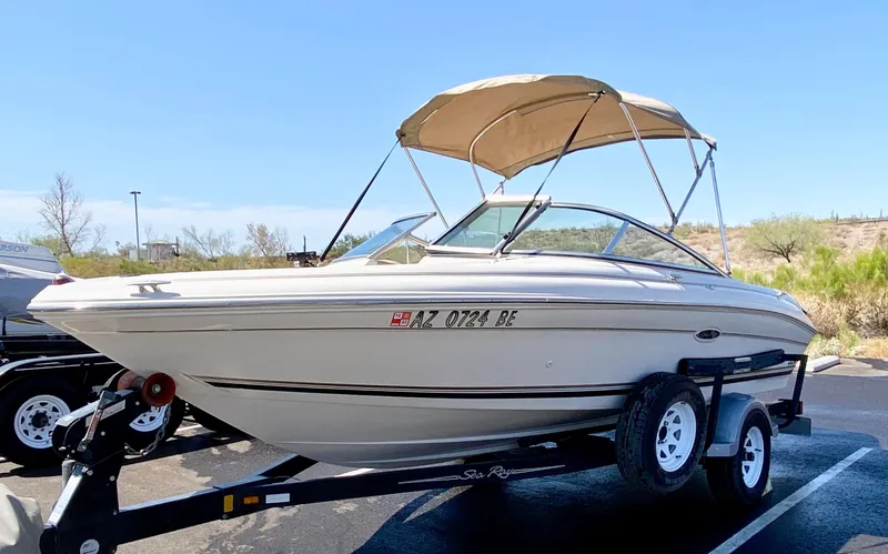 Slide: The Image of 2001 Sea Ray 185 Bow Rider on trailer, sunny day. - 4