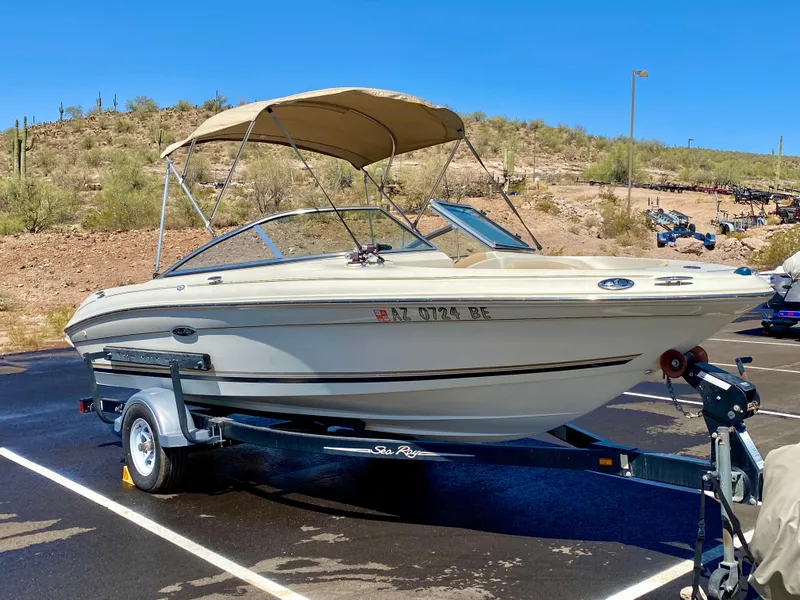 Slide: The Image of 2001 Sea Ray 185 Bow Rider on trailer in sunny setting. - 5
