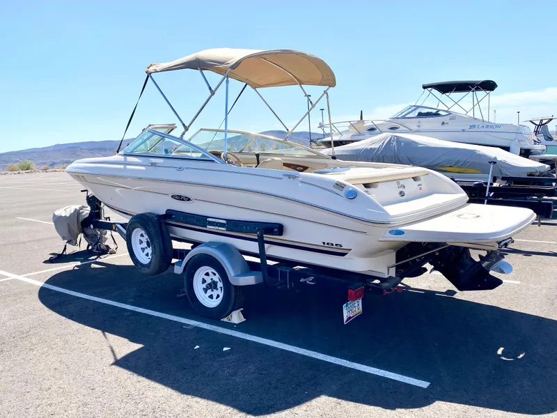 Slide: The Image of 2001 Sea Ray 185 Bow Rider parked outdoors on trailer. - 6