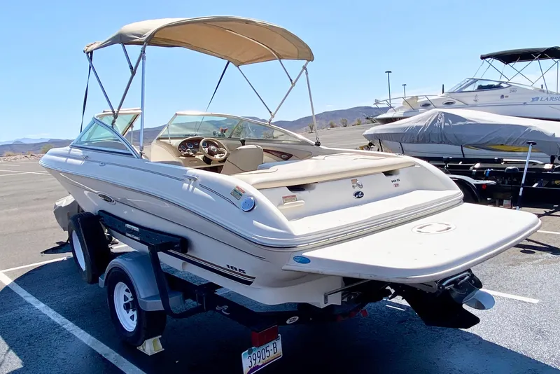 Slide: The Image of 2001 Sea Ray 185 Bow Rider parked outdoors on trailer. - 7