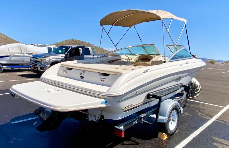 Slide: The Image of 2001 Sea Ray 185 Bow Rider parked outdoors on trailer. - 9