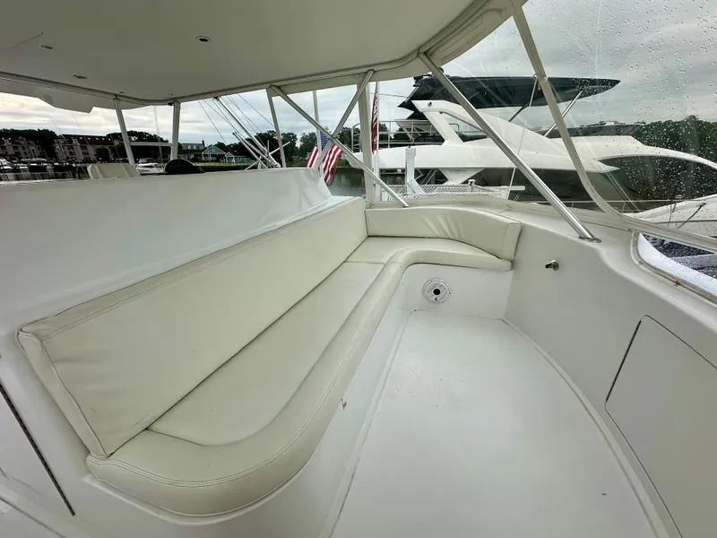 Slide: The Image of Luxurious seating area on a 2004 Viking 56 Convertible SONAR yacht. - 11