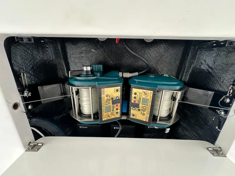 Slide: The Image of Fishing equipment in a 2004 Viking 56 Convertible SONAR boat compartment. - 22