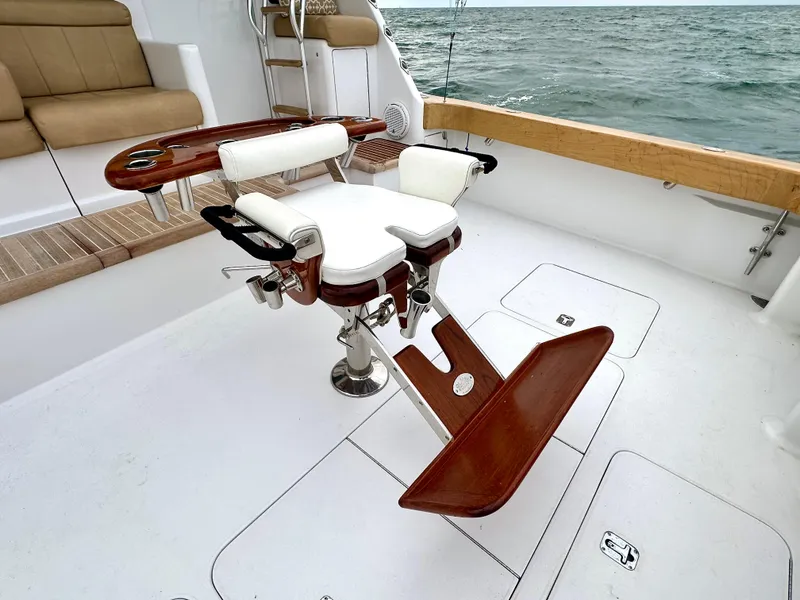 Slide: The Image of Fishing chair on 2004 Viking 56 Convertible SONAR yacht deck, ocean view. - 23