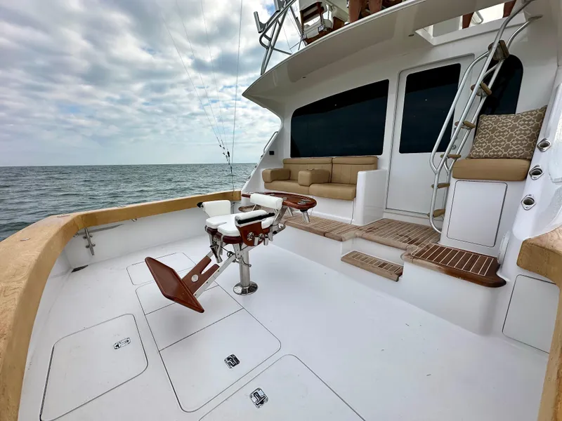 Slide: The Image of 2004 Viking 56 Convertible SONAR yacht deck with fishing chair, ocean view. - 24
