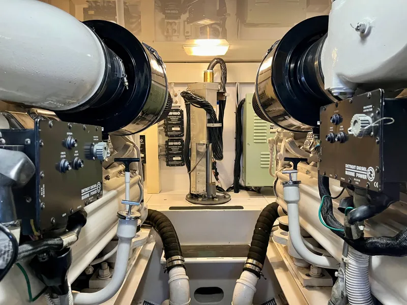 Slide: The Image of Engine room of 2004 Viking 56 Convertible SONAR yacht, showcasing mechanical components. - 28