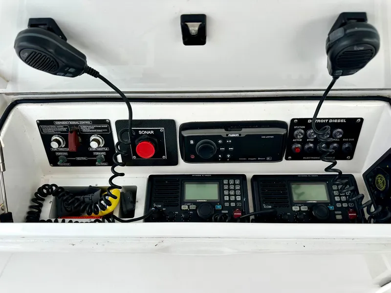 Slide: The Image of Control panel of 2004 Viking 56 Convertible SONAR with communication equipment and microphones. - 8