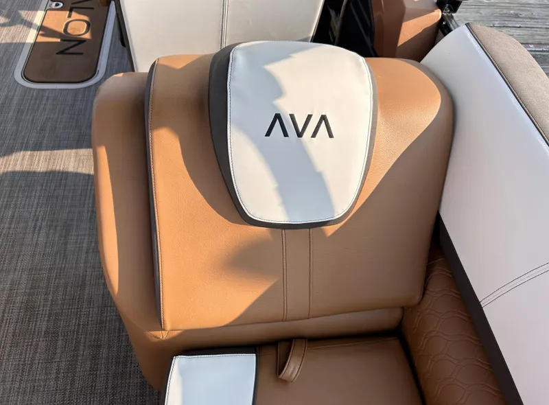 Slide: The Image of 2024 Avalon Catalina Quad Lounge boat seat with tan and white upholstery. - 17