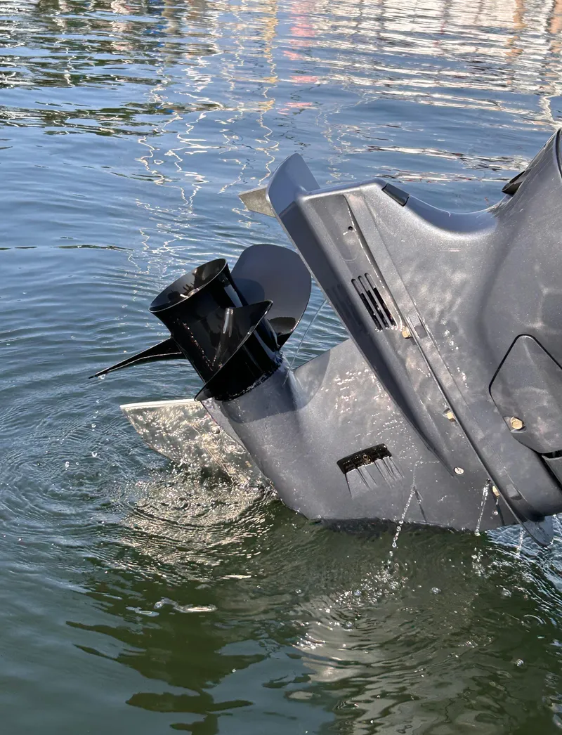 Slide: The Image of 2024 Avalon Catalina Quad Lounge boat motor in water. - 36