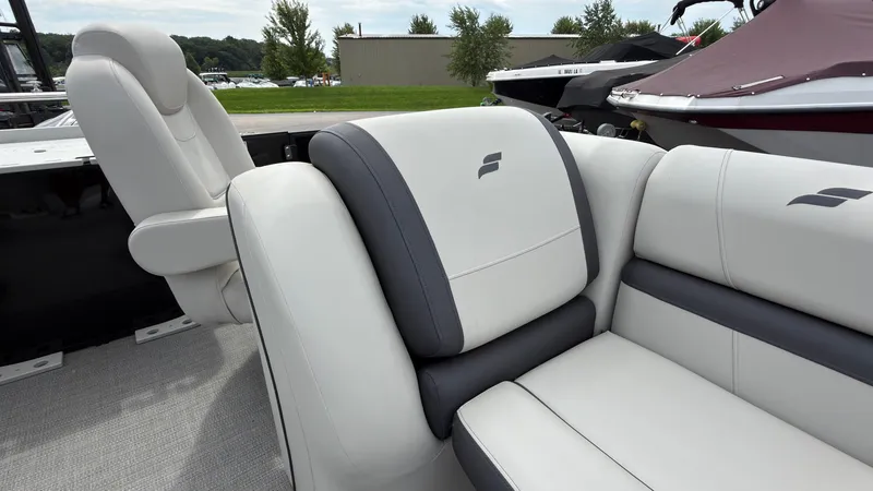 Slide: The Image of The 2025 Starcraft EXS 3 FD TT features sleek, cushioned seating with a modern design. - 34