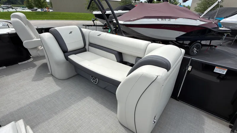 Slide: The Image of The image shows the interior of a 2025 Starcraft EXS 3 FD TT with sleek, light-colored seating. - 29