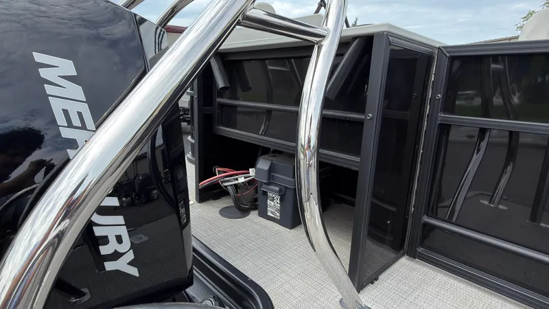 Slide: The Image of The image shows the deck of a 2025 Starcraft EXS 3 FD TT with shiny metal railings. - 55