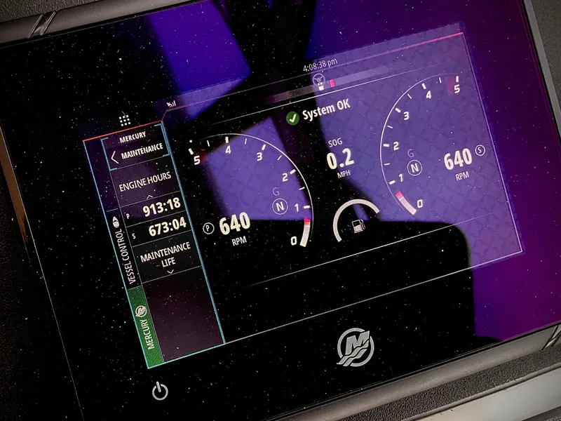 Slide: The Image of Digital dashboard of a 2007 Sea Ray 38 Sundancer showing engine hours and RPM. - 13