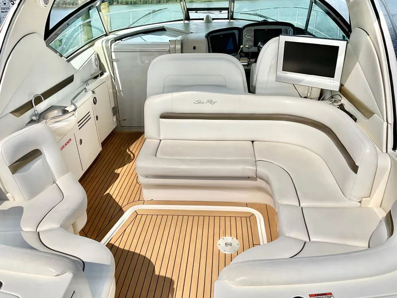 Slide: The Image of Luxurious interior of 2007 Sea Ray 38 Sundancer yacht with plush seating and modern amenities. - 2