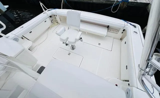 Slide: The Image of 2003 Tiara Yachts 3800 Open boat deck with seating and storage. - 36