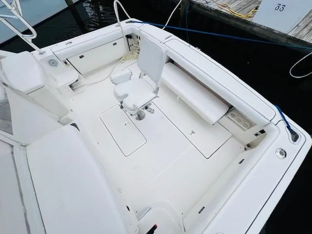 Slide: The Image of 2003 Tiara Yachts 3800 Open boat deck with seating and storage. - 37