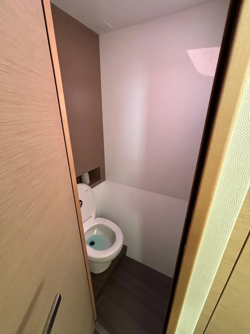 Slide: The Image of 2019 Fountaine Pajot Lucia 40 yacht bathroom with modern design and compact toilet. - 30