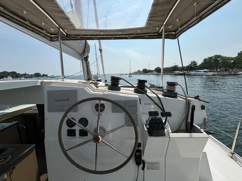 Slide: The Image of 2019 Fountaine Pajot Lucia 40 yacht helm with Garmin navigation, on calm waters. - 41