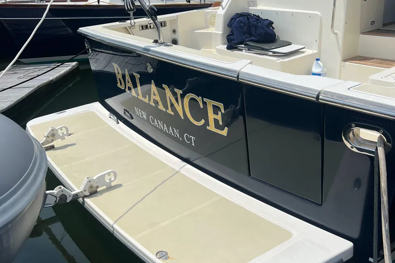 Slide: The Image of 2009 Sabre Hardtop Express boat named "Balance" docked in New Canaan, CT. - 5