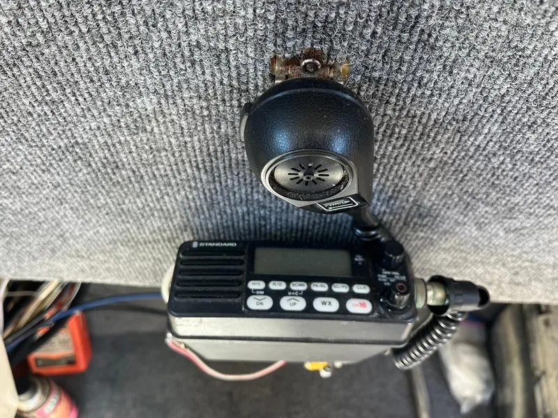 Slide: The Image of Kenwood radio and microphone installed in a 1994 Parker 2520 boat. - 28