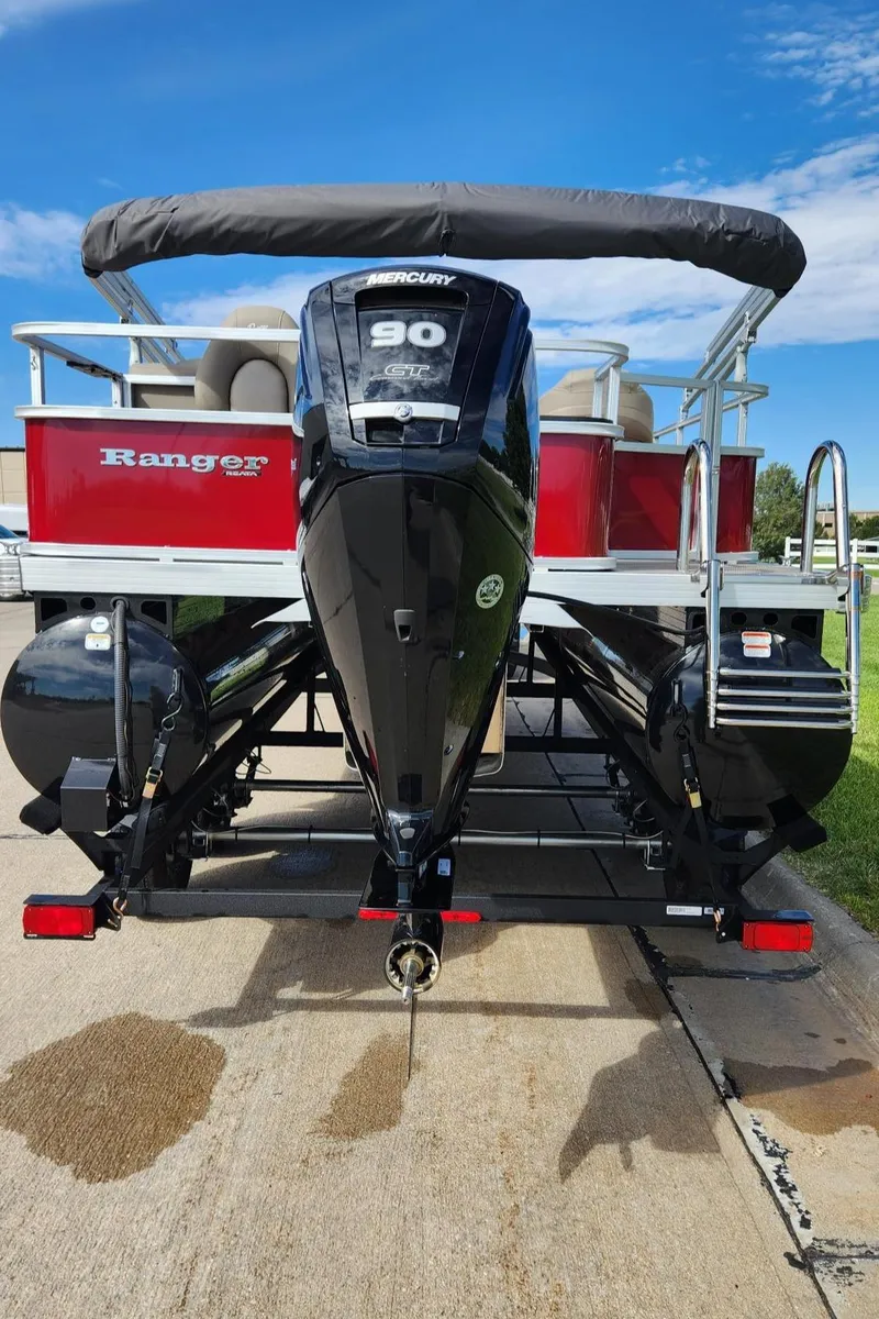 Slide: The Image of 2024 Ranger Reata 200F pontoon boat with Mercury 90 engine, red and black design. - 3