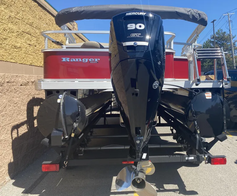 Slide: The Image of 2024 Ranger Reata 200F pontoon boat with Mercury 90 outboard motor, rear view. - 4