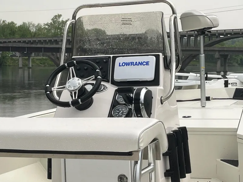 Slide: The Image of 2024 Ranger RB200 boat dashboard with steering wheel and Lowrance navigation system. - 7