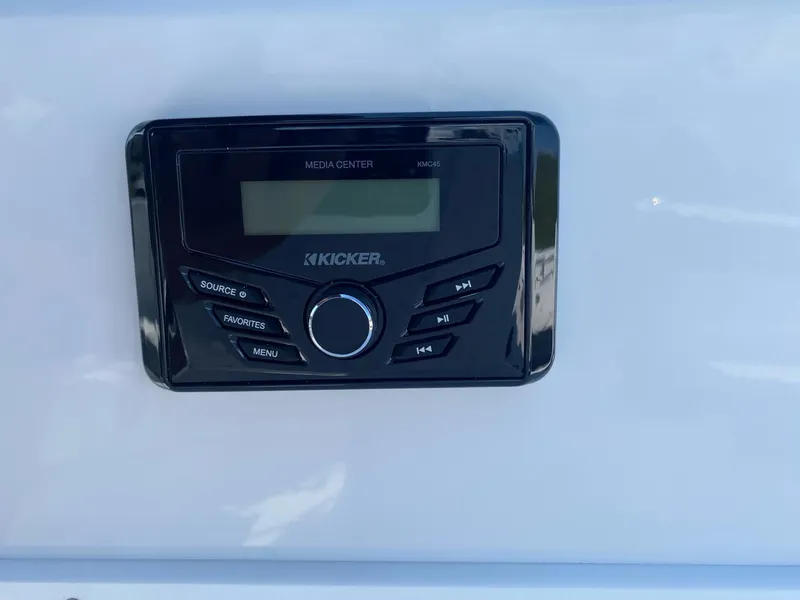 Slide: The Image of 2024 Tahoe 2150 media center with Kicker audio system. - 6