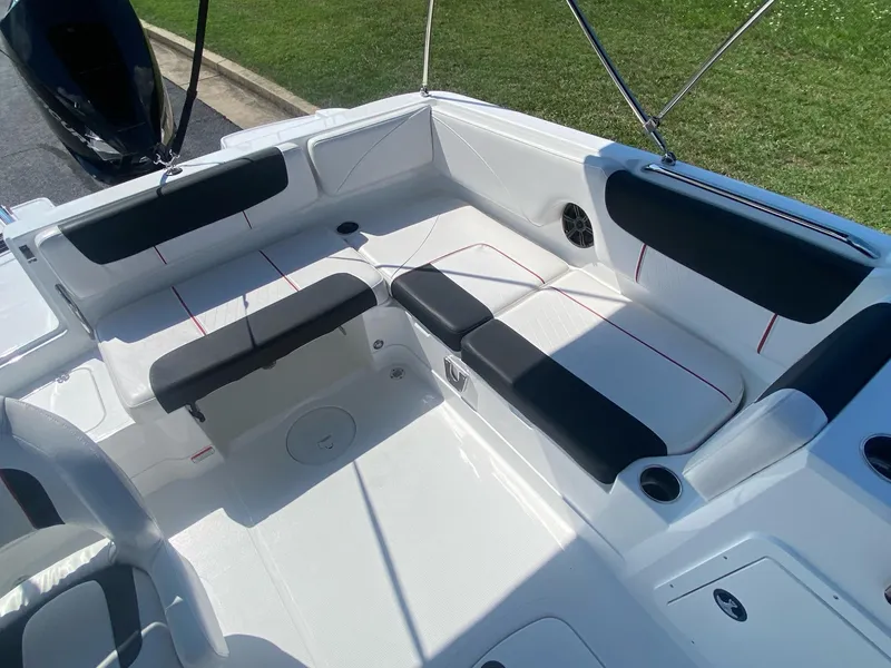 Slide: The Image of 2024 Tahoe 2150 boat interior with spacious seating and modern design. - 8