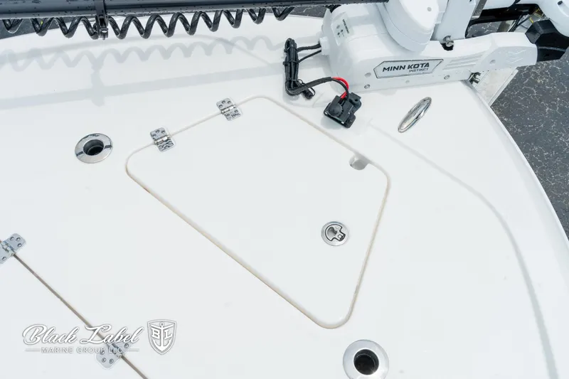 Slide: The Image of 2025 Caymas 281 HB boat deck with Minn Kota trolling motor. - 5