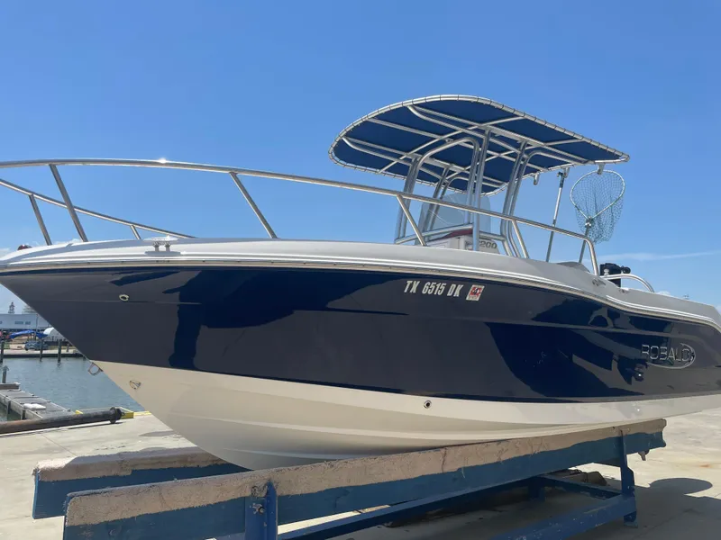 Slide: The Image of 2016 Robalo R200 Center Console boat on display at marina. - 0