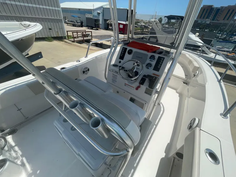 Slide: The Image of 2016 Robalo R200 Center Console boat interior with steering wheel and seating. - 13