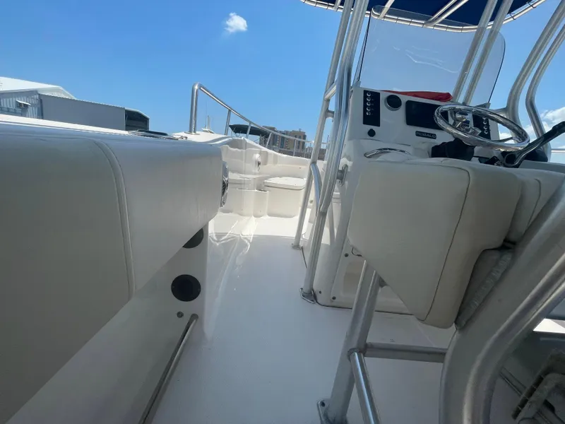 Slide: The Image of 2016 Robalo R200 Center Console boat interior with steering wheel and seating. - 18