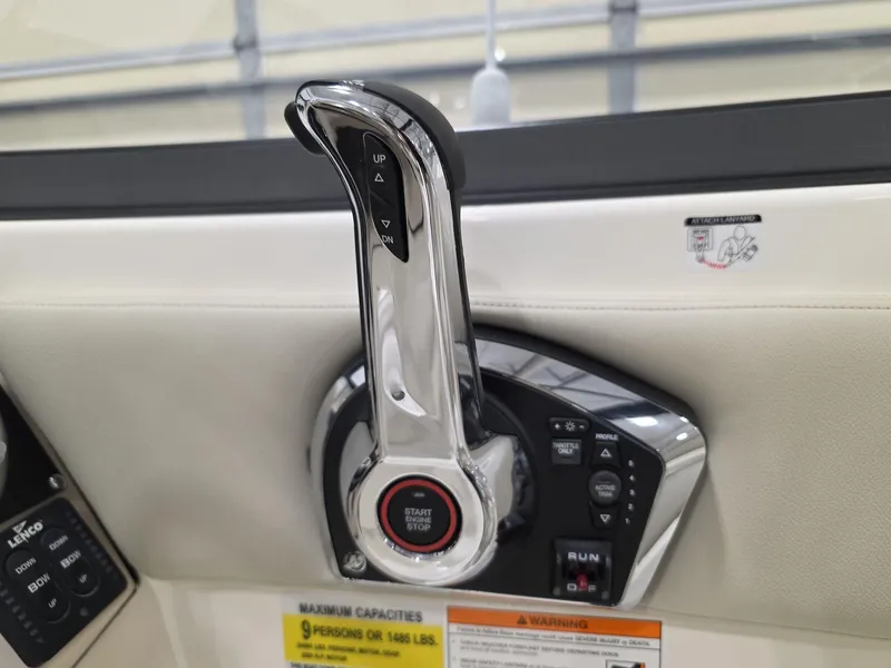 Slide: The Image of Throttle control of 2025 Boston Whaler 210 Vantage boat, featuring start/stop button. - 9