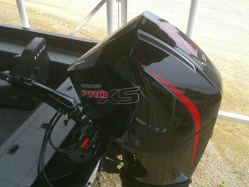 Slide: The Image of 2024 Lund 2075 Pro Guide with Mercury Pro XS outboard motor. - 11