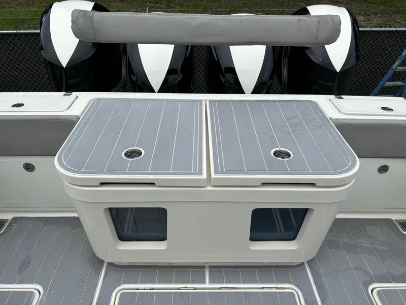 Slide: The Image of 2017 HCB Speciale boat on a lift, surrounded by trees and equipment. - 12