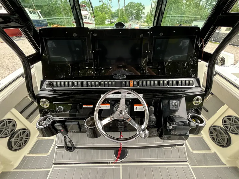 Slide: The Image of 2017 HCB Speciale boat with dual livewells open on deck. - 22