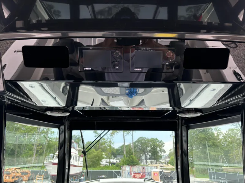 Slide: The Image of 2017 HCB Speciale boat interior with sleek seating and modern design. - 26